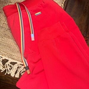 Vibrant coral Pants with Rainbow Belt